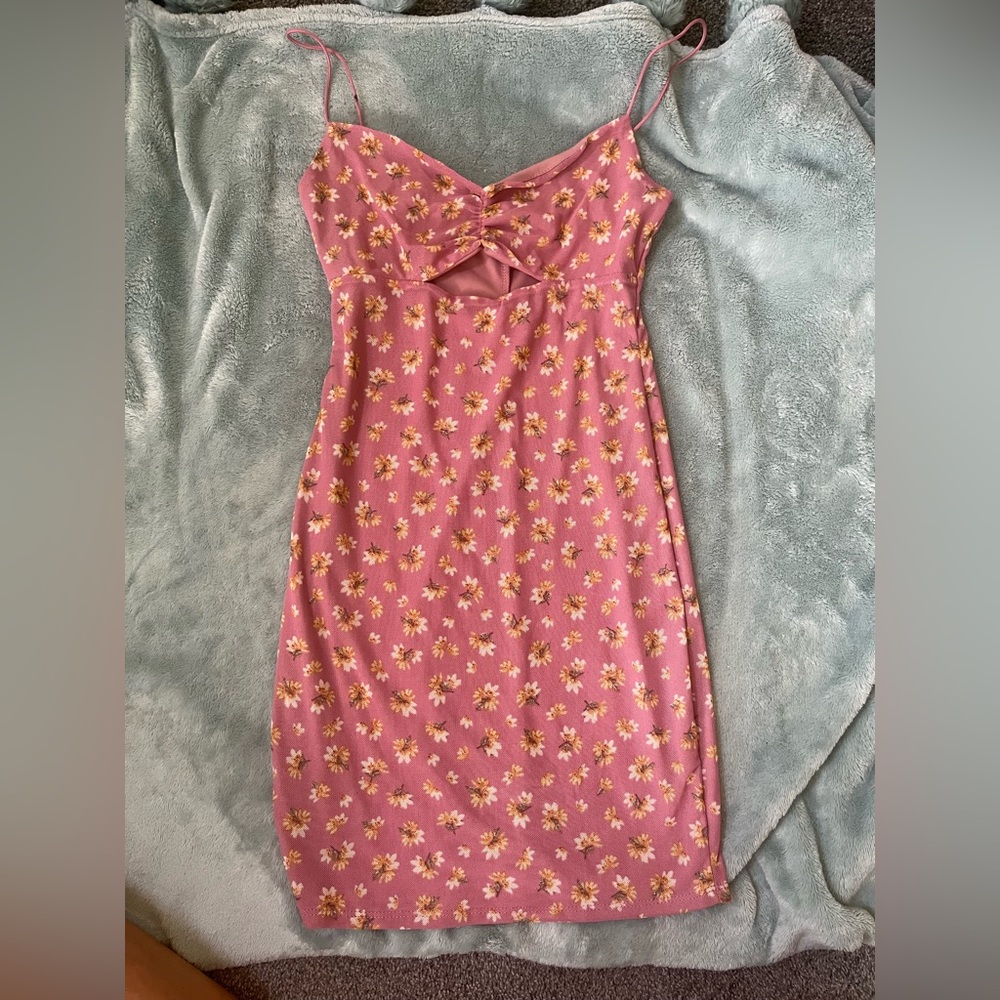 Purple dress with peek a boo hole. Yellow sunflowers